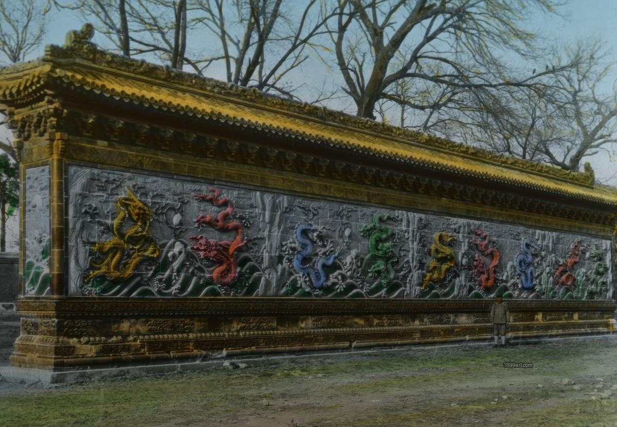 Nine Dragon Wall with nine colorful dragons, waves, and a boy