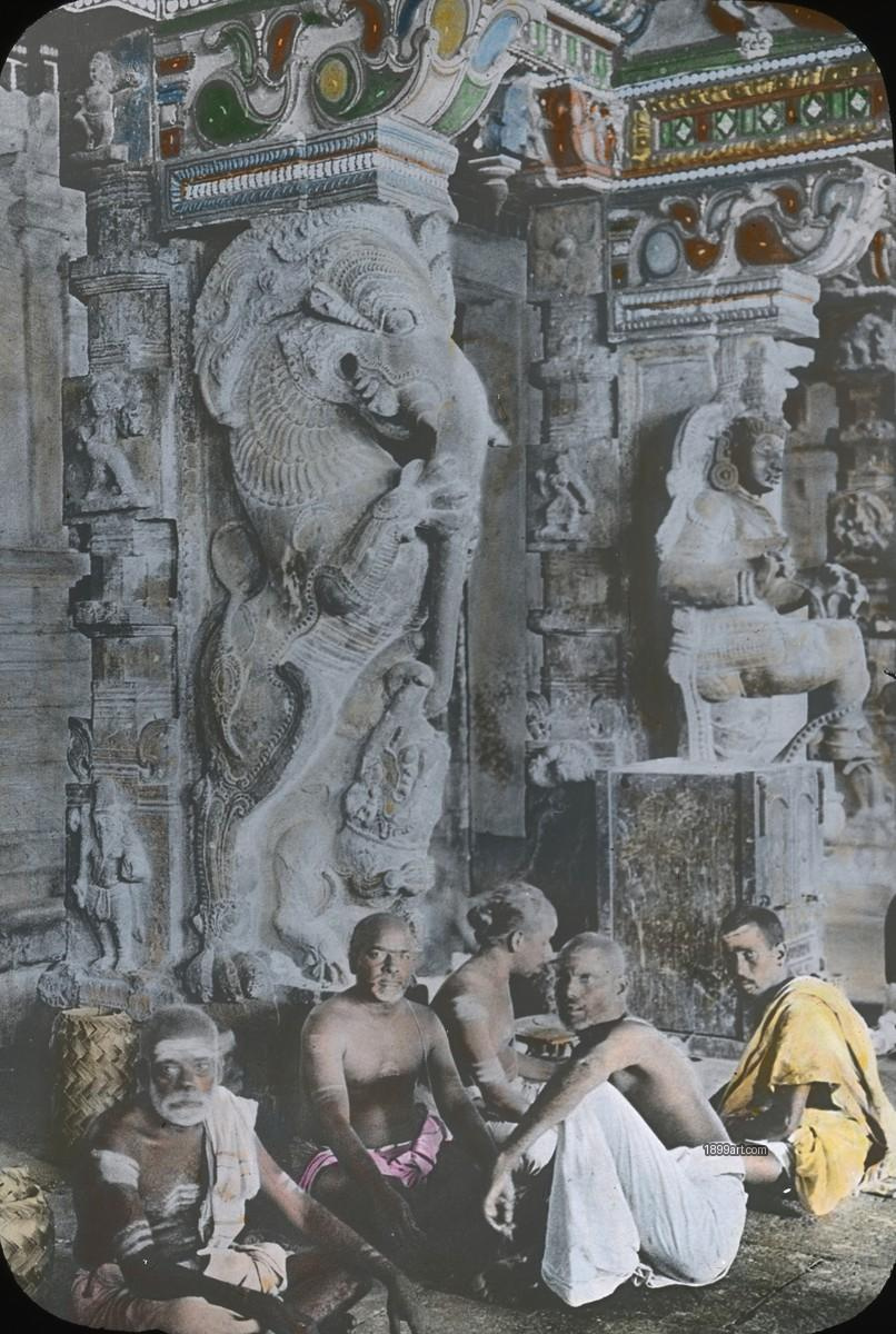 Hand-colored temple interior with ornate pillars and several men gathered