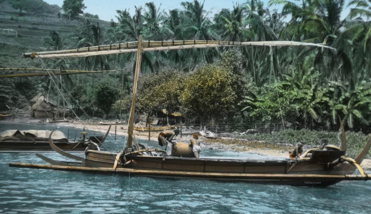 Handcolored outrigger sailboat with two men near palm-lined tropical shore