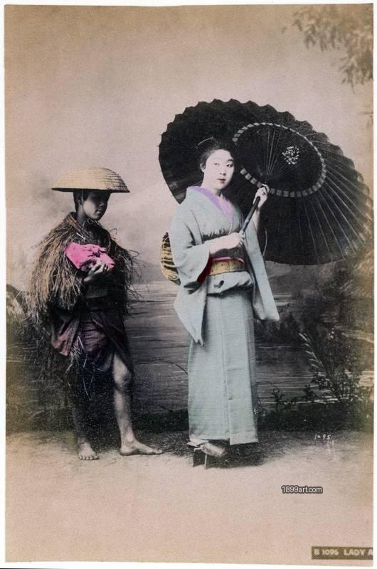 1899art Japan B 1095 — “Lady and Boy” (Woman with Parasol and Boy), hand-colored albumen print 1899art. Historical photograph from the 1899art Archive.