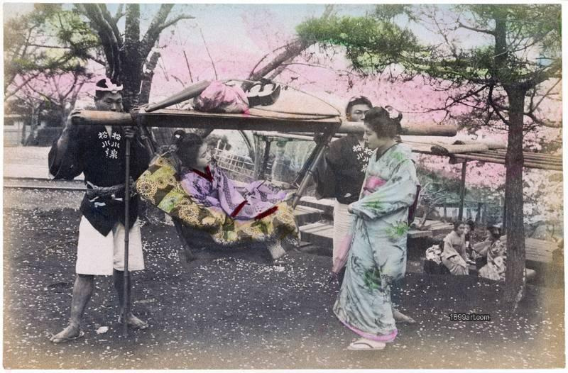 1899art Japanese Woman Reclining in a Rickshaw under Cherry Blossoms Handcolored 1900s 1899art. Historical photograph from the 1899art Archive.