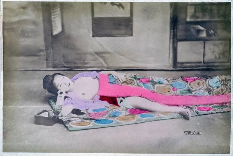 1899art Japan Reclining woman, studio genre scene for export market Handcolored 1900s 1899art. Historical photograph from the 1899art Archive.