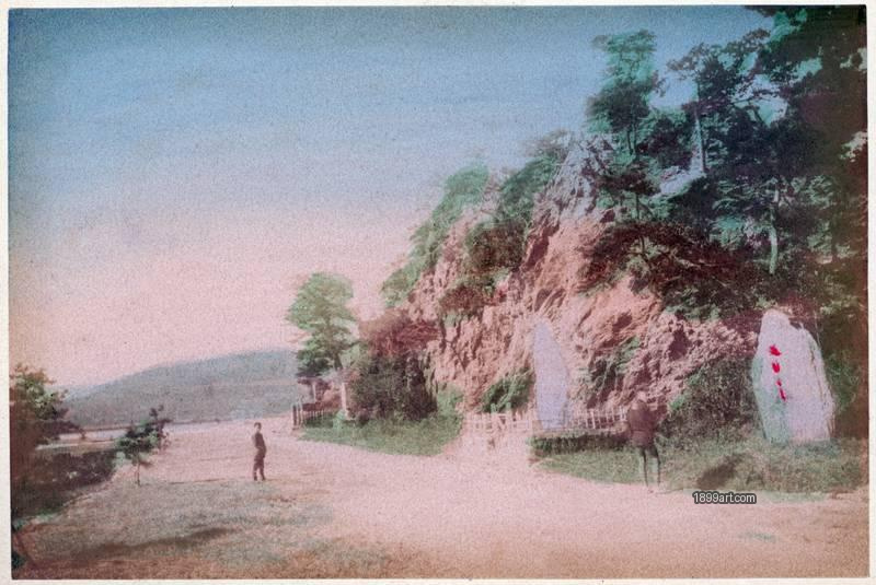 1899art Coastal Road with Stone Monuments, Awajishima Island (Seto Inland Sea), Japan Handcolored 1900s 1899art. Historical photograph from the 1899art Archive.