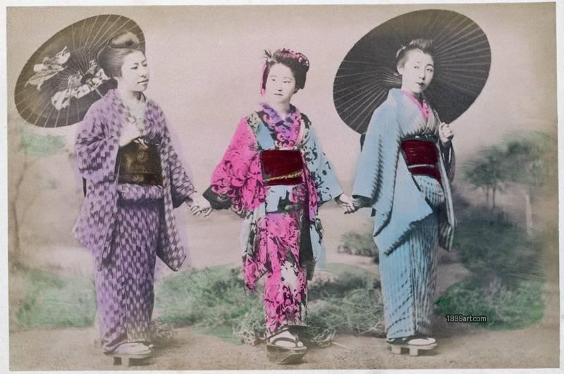 1899art Japan. Three Maiko Walking with Parasols Handcolored 1900s 1899art. Historical photograph from the 1899art Archive.