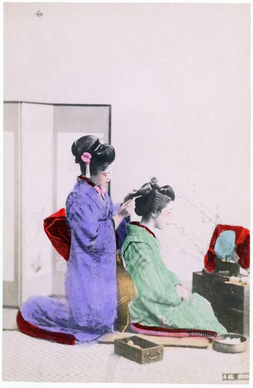 1899art Japan – Maiko Attending a Geisha’s Hairstyle, c. 1890 1899art. Historical photograph from the 1899art Archive.