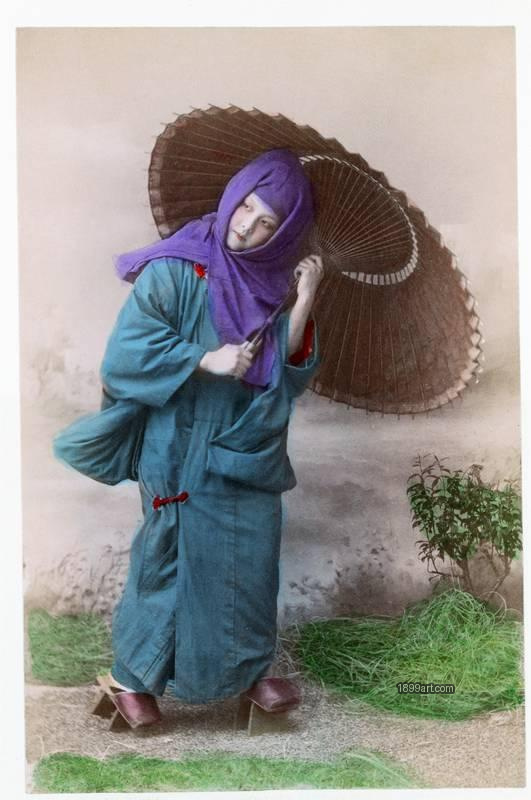 1899art Japan Girl in Winter Clothing with Paper Umbrella, Japan, c. 1890 Handcolored 1899art. Historical photograph from the 1899art Archive.