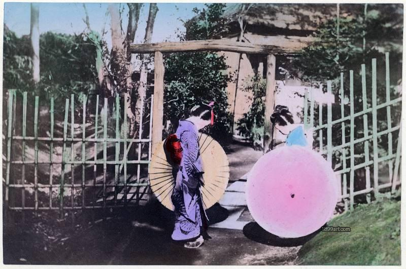 1899art Japan Prince Hotta’s Garden – Maiko with Paper Umbrellas at a Garden Entrance, c. 1890 Handcolored 1899art. Historical photograph from the 1899art Archive.