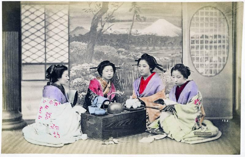 1899art Japan Four maiko gathered for a tea ceremony, studio scene with Mount Fuji backdrop, no. 128 (Kusakabe Kimbei) 1899art. Historical photograph from the 1899art Archive.