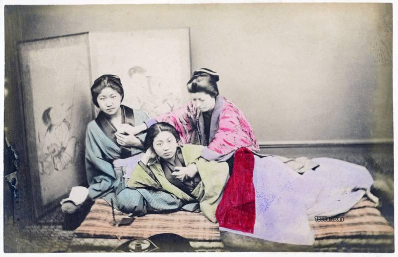 1899art Anma Treatment on Meiko at Rest – Intimate Studio Scene, Japan (Meiji Period, c. 1890s) Handcolored 1900s 1899art. Historical photograph from the 1899art Archive.