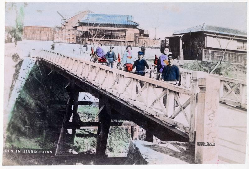 1899art Japan Girls in Jinrikishas on a Wooden Bridge (Ebisu Bridge, Attributed) Handcolored 1900s 1899art. Historical photograph from the 1899art Archive.