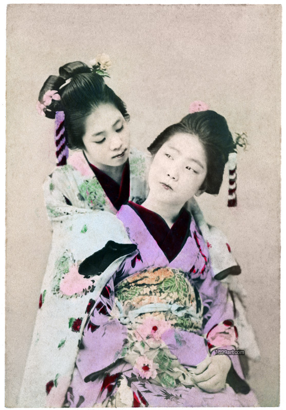 1899art Two Meiko in an Intimate Studio Pose, Japan, Meiji Period (c. 1890s) Handcolored 1900s 1899art. Historical photograph from the 1899art Archive.